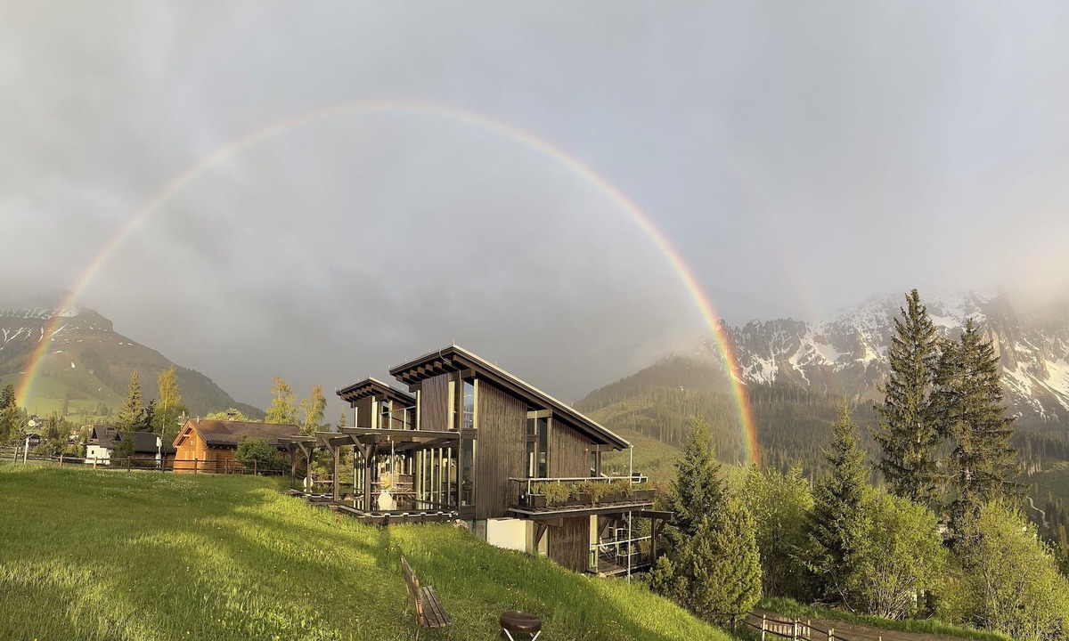 Carezza House | Architect's house Karersee, view of rose garden, Latemar and western Alps