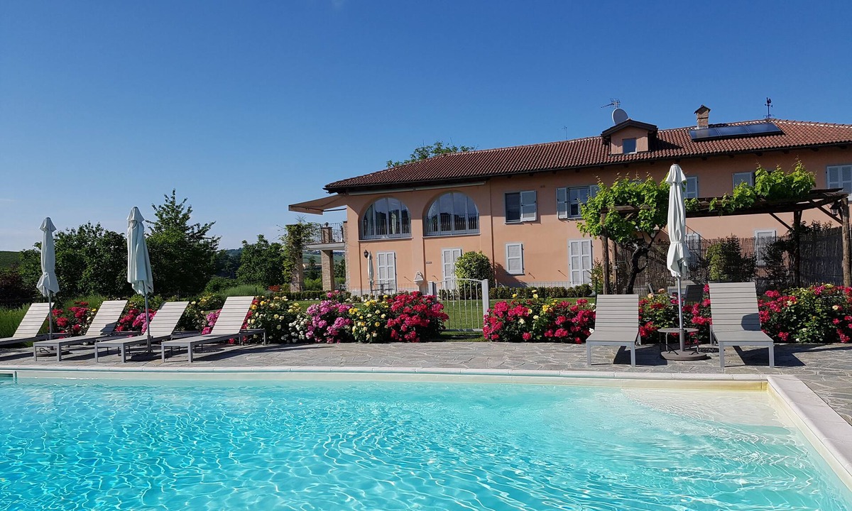 Castiglione Tinella Apartment | Cascina del Noce - Alba. Spacious apartment with exceptional views and pool