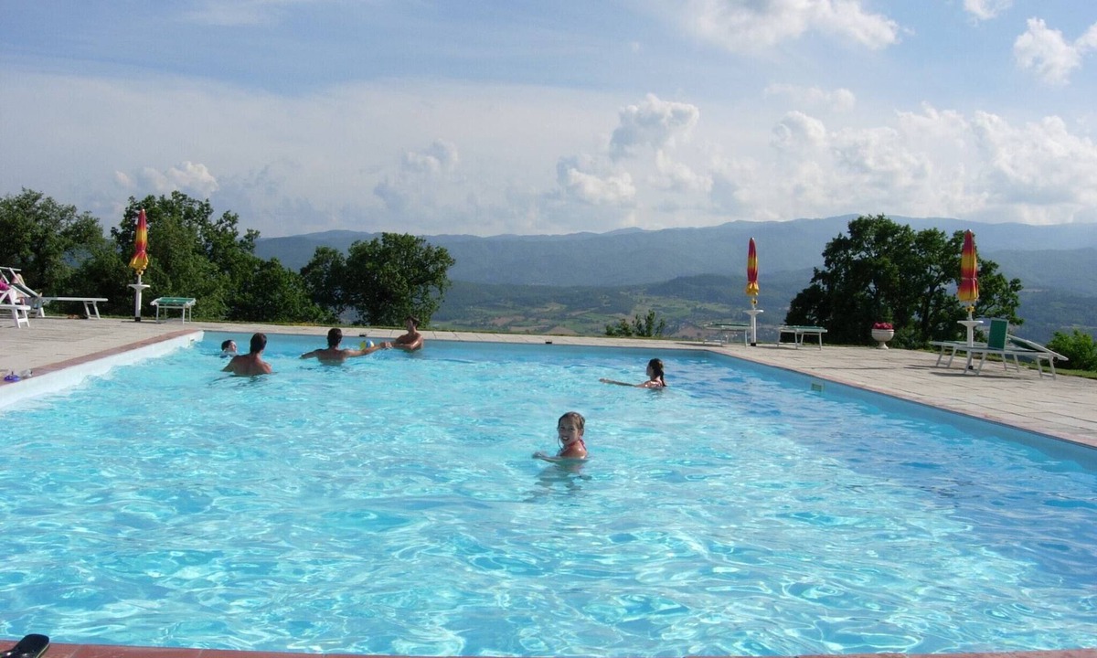 Poppi Apartment | Farmhouse in Tuscany with Pool & Valley Views