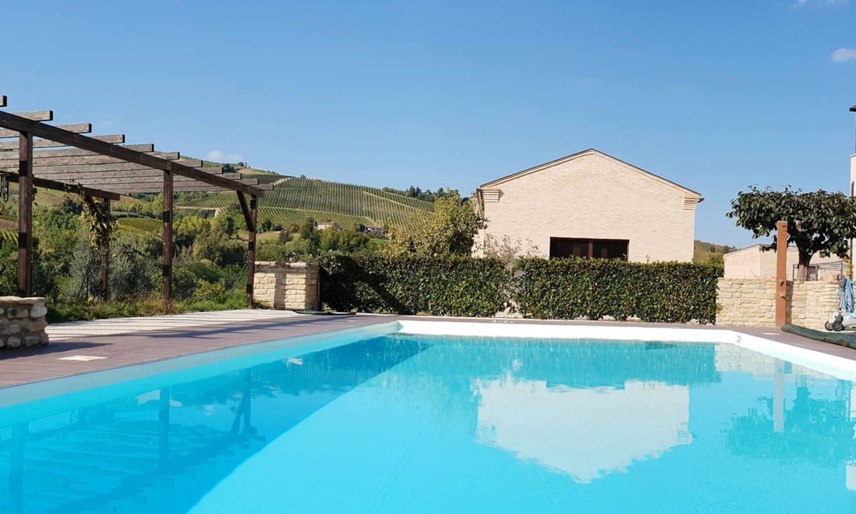 Montalto delle Marche Apartment | Homerez - Appartement for 4 ppl. with shared pool at Montalto delle Marche