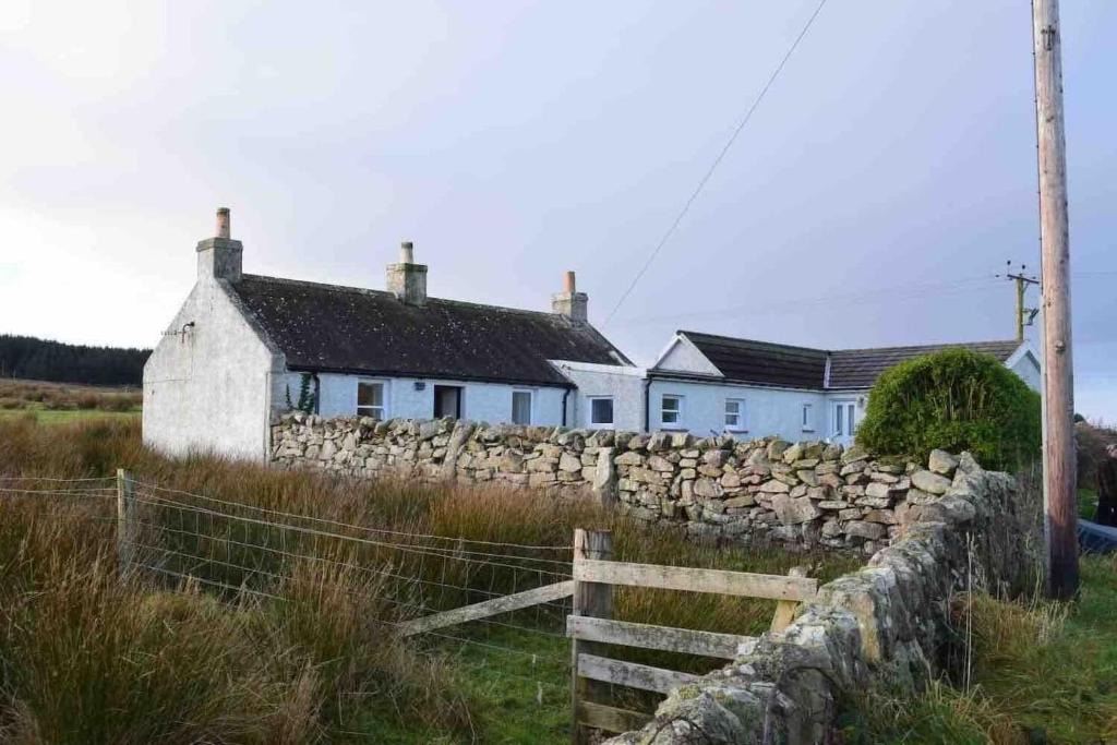 Laphroaig House | Quaint and quirky coastal Cottage Islay