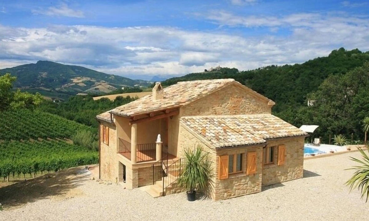 Porchia House | Spectacular views across the pool to mountains and historic village.