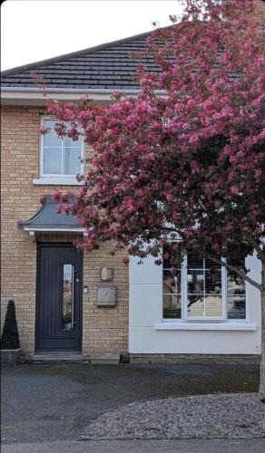 Dunmurry House | Stylish 5-bedroom retreat just minutes from Belfast city