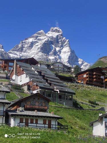 Cervinia Apartment | TANA DELLA MARMOTTA - renovated, ski in ski out, turkish bath, garage, storage