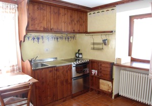 Courmayeur house with a view, two-room apartment with a small garden
