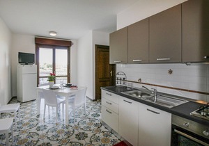 Spend a great vacation by the sea in this beachfront apartment.