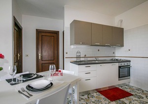 Spend a great vacation by the sea in this beachfront apartment.