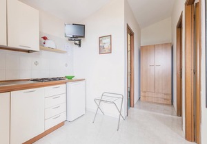This modern bungalow belongs to a vacation home complex directly above the sea, with a unique panora