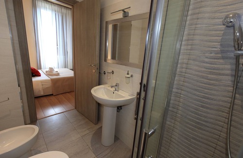 Esquilino Bed & Breakfast | Aria Rome Rooms double room with balcony and view of Basilica di San Giovanni