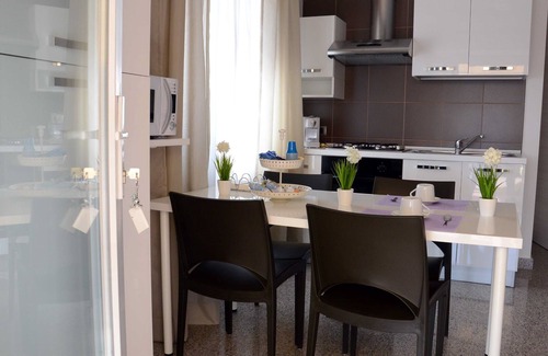 Matera Apartment | Quad room-Family-Ensuite with Shower-Garden view