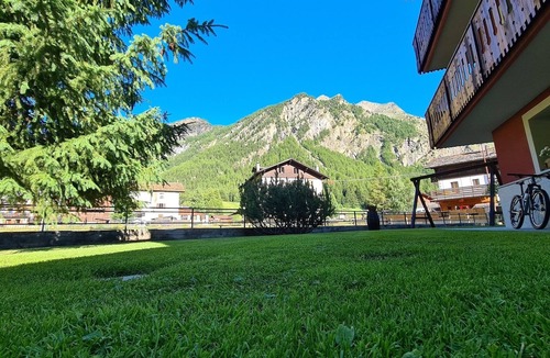 Cogne Apartment | Apartment '4061 Maison Gerard - Torre Del Gran St. Pietro' with Mountain View, Garden and Wi-Fi