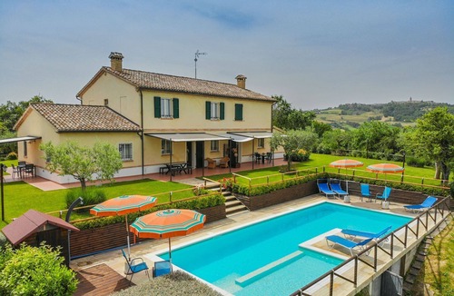 Orciano di Pesaro Apartment | Apartment Il Contadino with pool in La Casa in Campagna, close to Orciano, 20 minutes from the sea