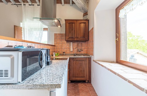 Chianciano Terme Apartment | Apartment 'La Loggia' with Mountain View, Shared Pool and Wi-Fi