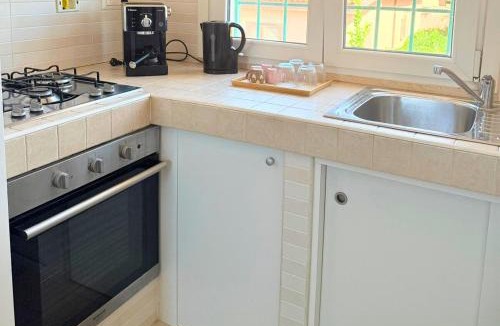 Focene Apartment | Azure Oasis with parking near the airport & beach