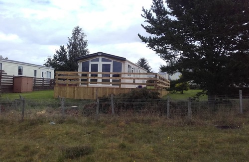 Boat of Garten House | Chalet with large decking, great views, WIFI included. ATTENTION SKIERS - IDEAL