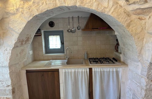 Locorotondo Villa | Charming 300-Year-Old Trullo with Large Private Pool, Garden, Pizza Oven & BBQ