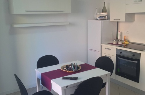 Badesi Apartment | directly on the sea new apartment with garden and swimming pool