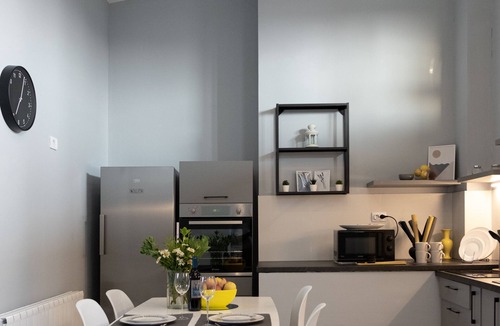 Vozdovac Apartment | Gray Cloud of Sky Point Apartments