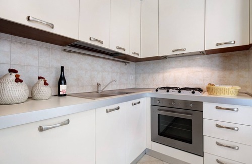 Desenzano del Garda Apartment | Holiday Apartment 'Katy Lake Salvia' with Shared Pool, Private Terrace & Wi-Fi