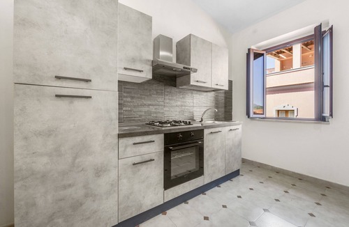 Arbus House | Holiday Home 'Arbus Aventino Centrale' with Private Terrace and Air Conditioning