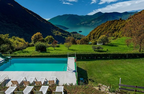 Marone Ski Chalet | In a green and relaxing atmosphere, with pool and stunning lake view.