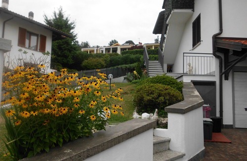 Cissano Apartment | Intimate apartment with terrace overlooking the lake, garden and air conditioning
