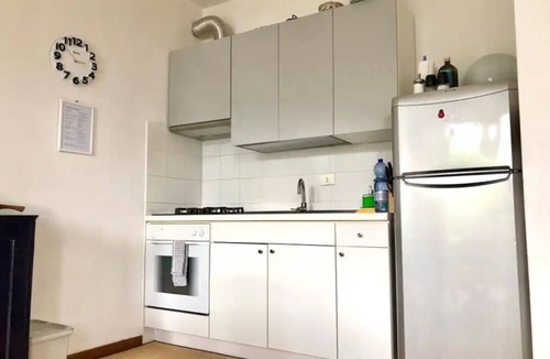 Sala Comacina Apartment | Lake View. Beautiful three-room apartment with garden and pool. Lake Como.