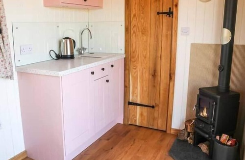 Holyhead Cottage | LLETY'R BUGAIL, country holiday cottage, with open fire in Holyhead