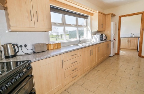 Ballymoney House | MOUNTAIN VIEW, with open fire in Armoy, County Antrim