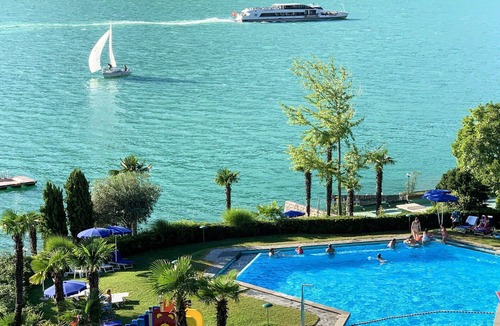 Bissone Apartment | Nice apartment for 4 guests with pool, A/C, WIFI, TV, balcony and panoramic view