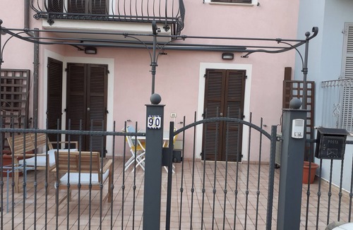Senigallia House | Pergola with bougainvillea