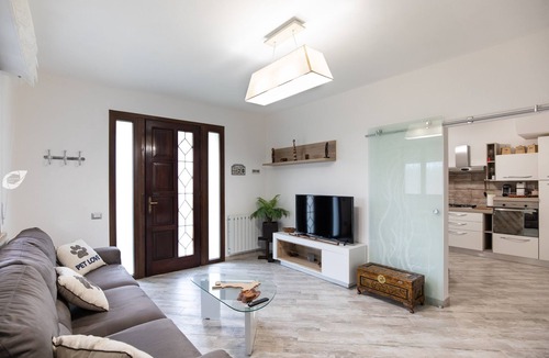 Torre del Lago Puccini House | Seaside villa sleeping up to 8 people with private garden and 2 parking spaces.