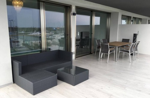 Aprilia Marittima Apartment | Stylish maritime apartment three-sided terrace dream in the nature reserve