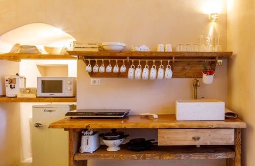 Sasso Barisano Apartment | Suite in cave with terrace and view of Sassi di Matera