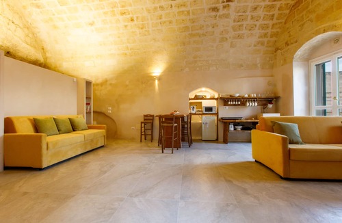 Sasso Barisano Apartment | Suite in cave with terrace and view of Sassi di Matera