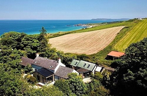 Ballycastle Cottage | The Woods at White Park Bay With a Private hot Tub. Blissful Relaxation Awaits!
