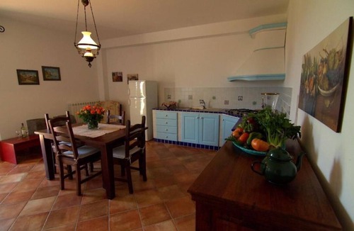 Carruba House | Torre Archirafi Resort -refuge nestled in the green Sicilian countryside.
