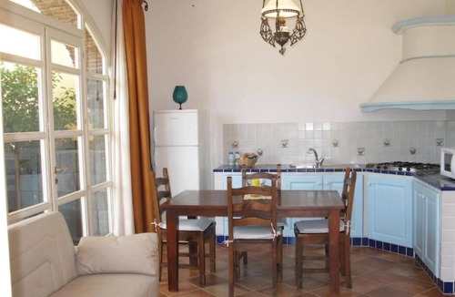 Carruba House | Torre Archirafi Resort -refuge nestled in the green Sicilian countryside.