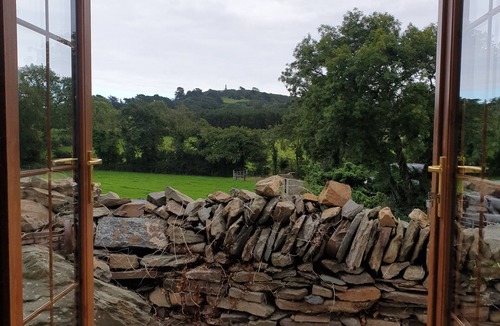 Downpatrick Cottage | Traditional Irish cottage with views of Slieve Patrick