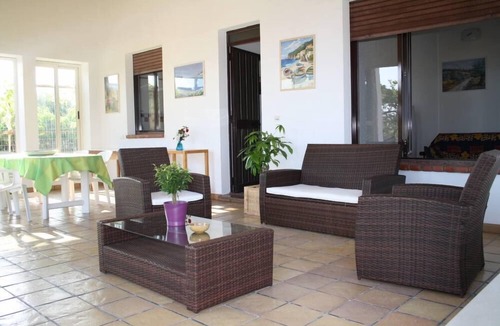 Marina di Modica Villa | Villa Sara, an air-conditioned veranda overlooking the sea.