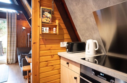 Carrbridge Cabin | Wolf Lodge - a lodge that sleeps 4 guests in 2 bedrooms