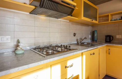 Le Cure Apartment | Yellow Home By MMega