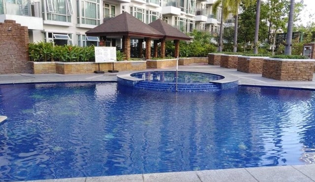 CF10C The Parkside Villas, Family room with kichen, dining,living area & balcony