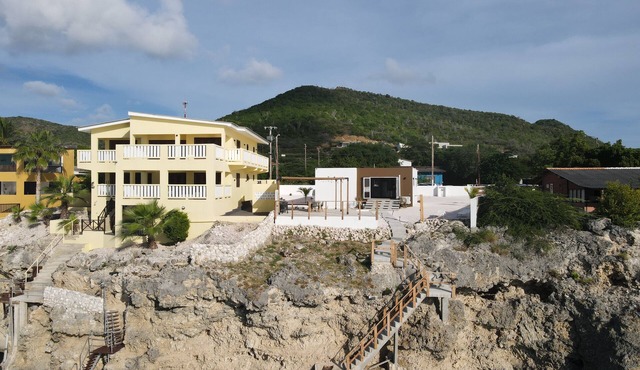 Luxury Oceanfront Retreat with Panoramic Views and Modern Comforts