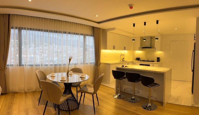 Luxury Suite with Skyline Views in Exclusive District