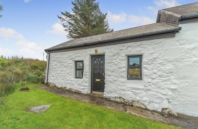 A tiny, traditional cottage tucked away on the Ross of Mull, close to the sea.