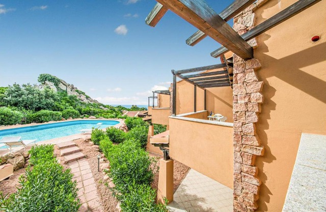 Nice apartment in TrinitadAgultu OT with 1 Bedrooms, WiFi and Outdoor swimming pool