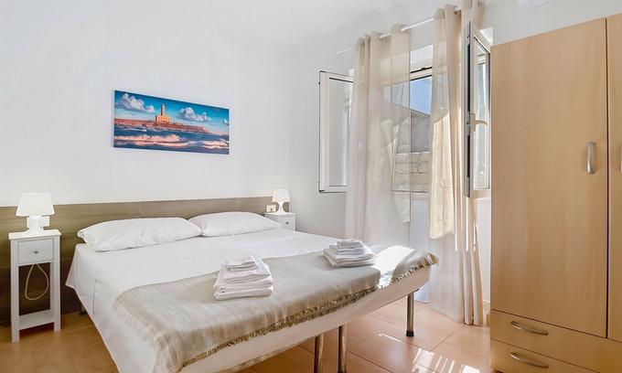 Montincello Apartment | Apartment 'La Mignola - Quadri 6' with Private Terrace, Wi-Fi and Air Conditioning