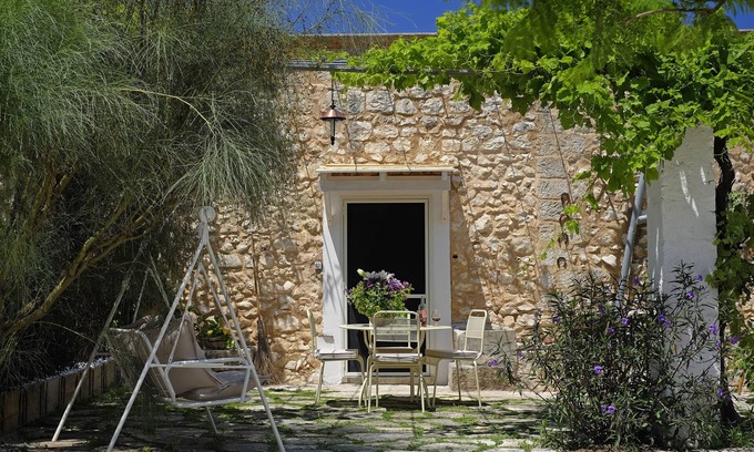 San Vito dei Normanni House | Masseria Ortensia. Garden with swing, hammock, deck chairs. Near the beaches.