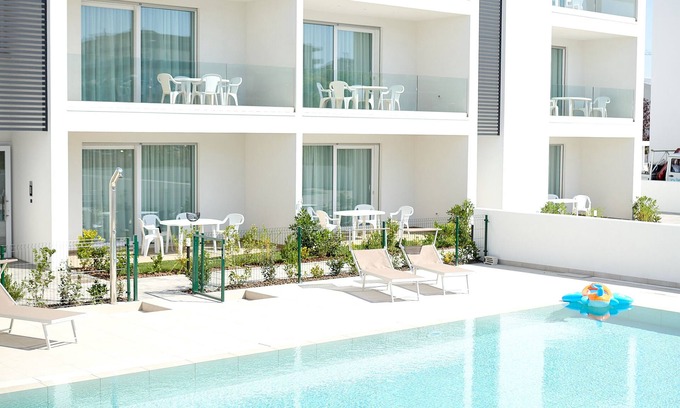 Faro Apartment | NEW in Jesolo with swimming pool, near the sea. Apartment 1